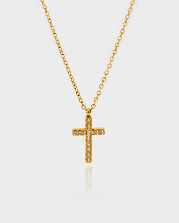 Discover our Gold Cross Necklace, featuring a stunning crystal-adorned design. A timeless symbol of faith, perfect for everyday elegance or as a meaningful gift.