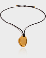 "Close-up of the Nirvana Necklace by Queen & Collection, showcasing its dual classic chain styles in premium 18K gold plating on stainless steel, highlighting its hypoallergenic and tarnish-resistant features."
