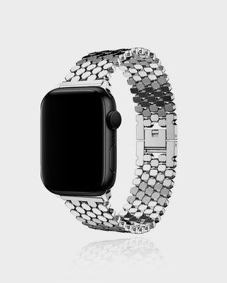 Smartwatch with a silver metal band on a light gray background