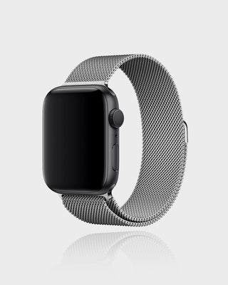 Smartwatch with a silver Milanese loop band on a light gray background