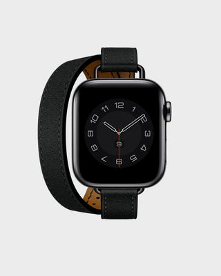Smartwatch with a black band on a light gray background