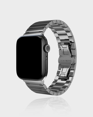 Silver metal watch band on a white background