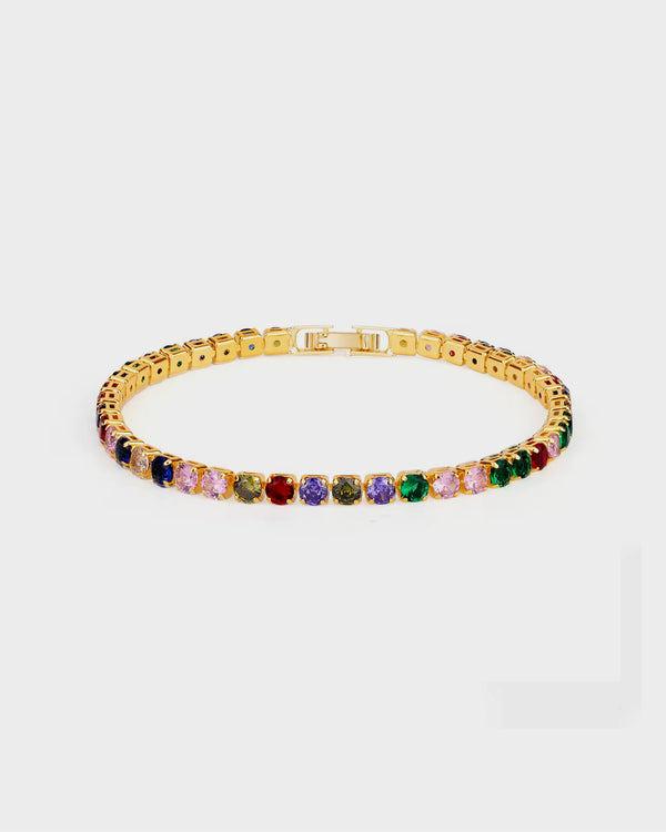 Gold bracelet with colorful gemstones on a white background