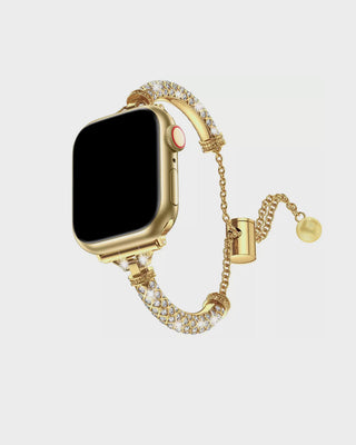 Gold smartwatch with a decorative chain on a light gray background