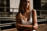 "Model wearing the Istanbul Bracelet, showcasing its delicate gold-plated cuff and subtle cubic zirconia accents, perfect for layering or as a standalone statement piece."

