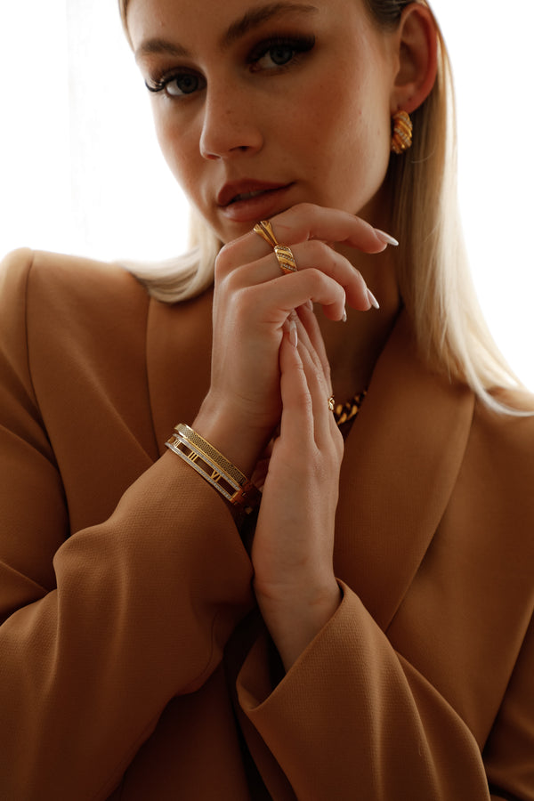 "Century Bracelet: Elegant bracelet jewelry featuring a modern design with intricate details, perfect for layering or as a standalone piece in your accessory collection."

