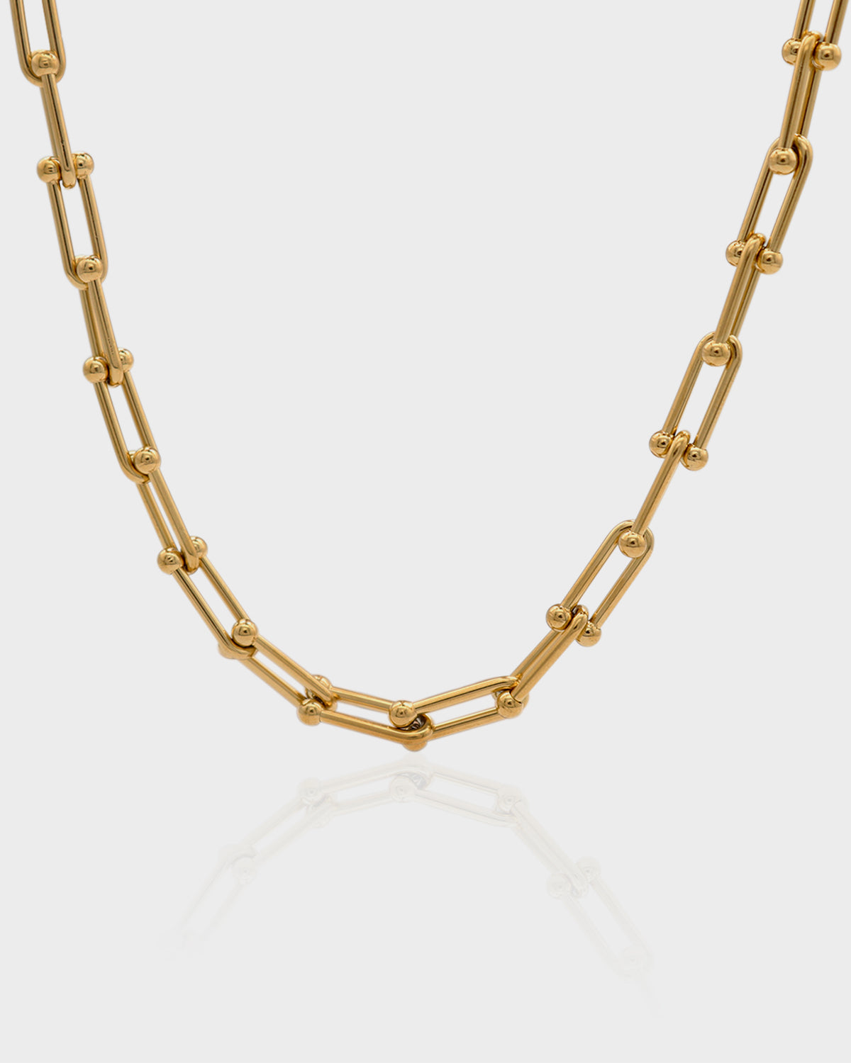 Elegant Vogue Necklace from Queen and Co. featuring a delicate chain with a sophisticated pendant, perfect for adding a touch of class to any outfit.